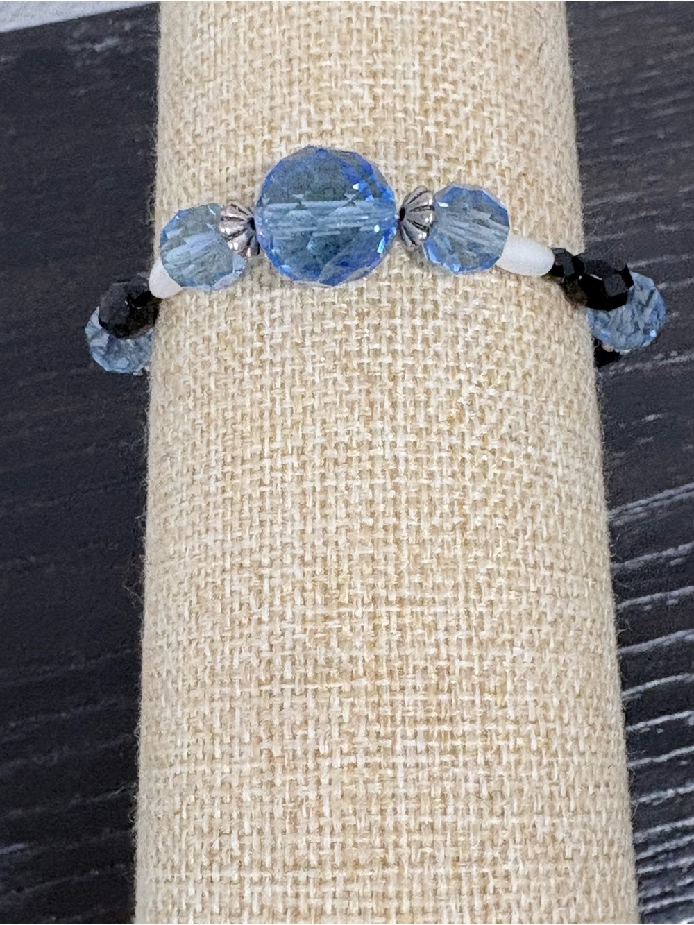 Handcrafted blue crystal with black bead , silver tone accents beaded bracelet